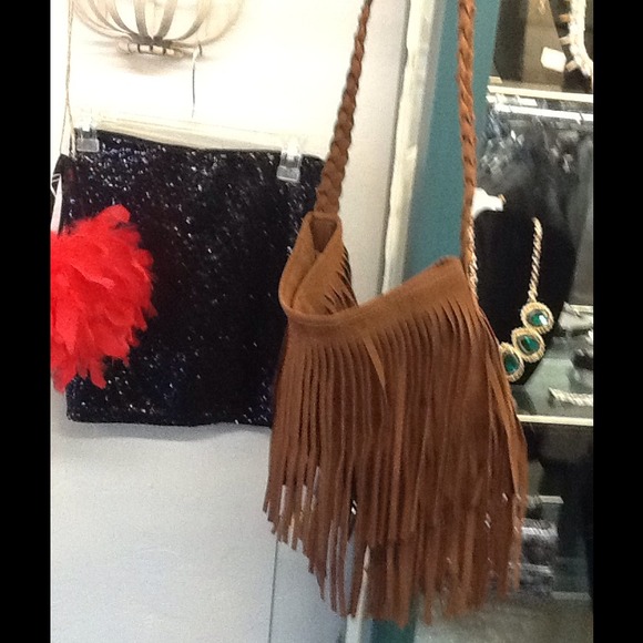 Tassell tan colored purse