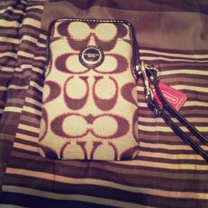 Authentic Coach iPhone holder, wristlet.
