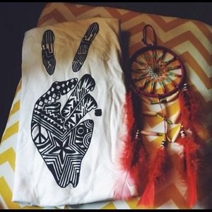 I am selling a Gildan white unisex tank top!