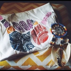 I am selling a Gildan, white, unisex tank top!