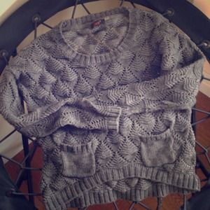 Grey knit sweater.