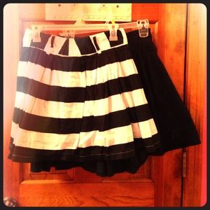 Two black and white high waisted flowy skirts