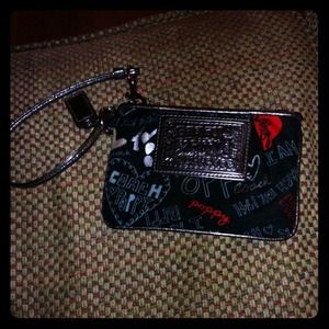 REDUCED!! Coach wristlet!