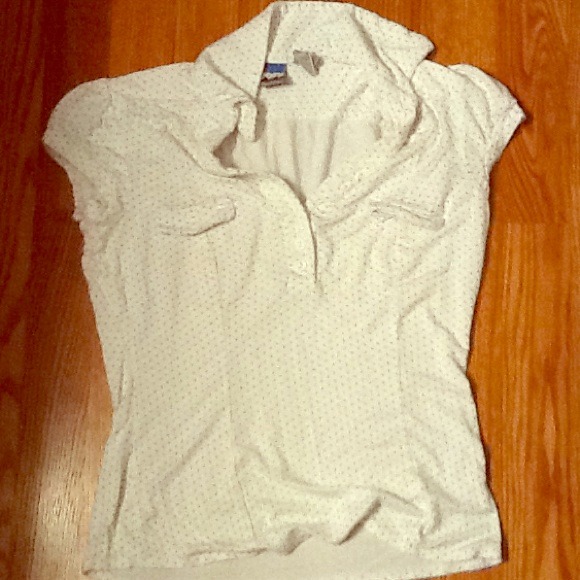 Woman's white poka dot shirt