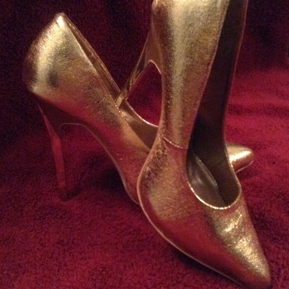 Gold high heel stilettos