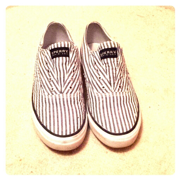 Sperry top-sider slip on tennis shoes.