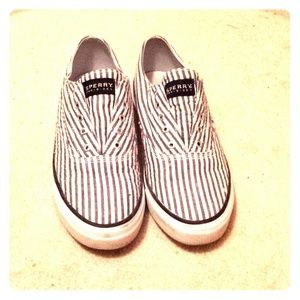 Sperry top-sider slip on tennis shoes.