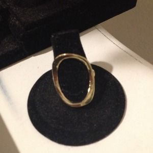 Gold colored oval ring