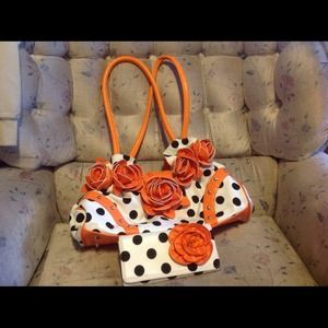 Orange and black purse with wallet