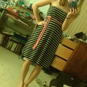 Stripped dress with a pink belt