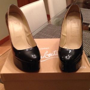 Size 8 black Christian loboutins