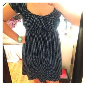 Teal dress with white polka dots.