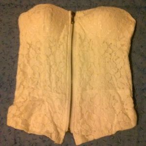 White, small corset and zipper in the middle