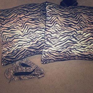 2 zebra pillows and size 7 1/2 zebra slippers
