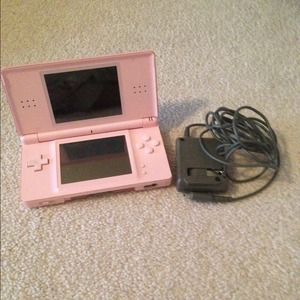 Nintendo D.S with charger included