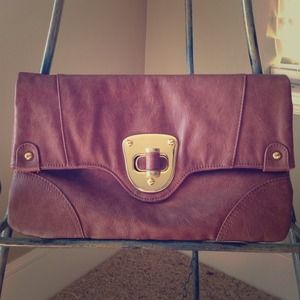 Brown clutch with gold detail.