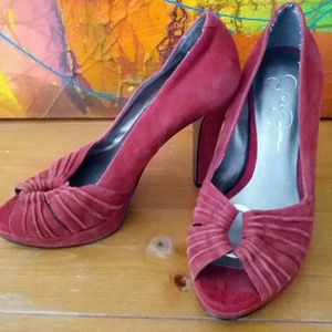 Red suede (real leather) peep toe platform pumps.