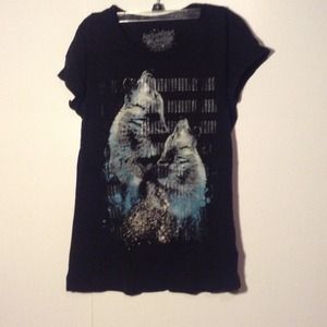 Black wolf shirt and 2xl wolf shirt.