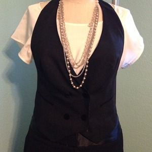 Black tuxedo two piece suit.