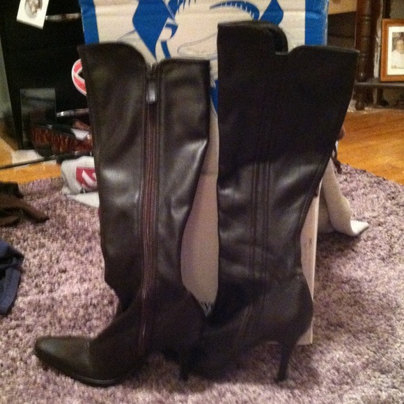 Brown tall boots.