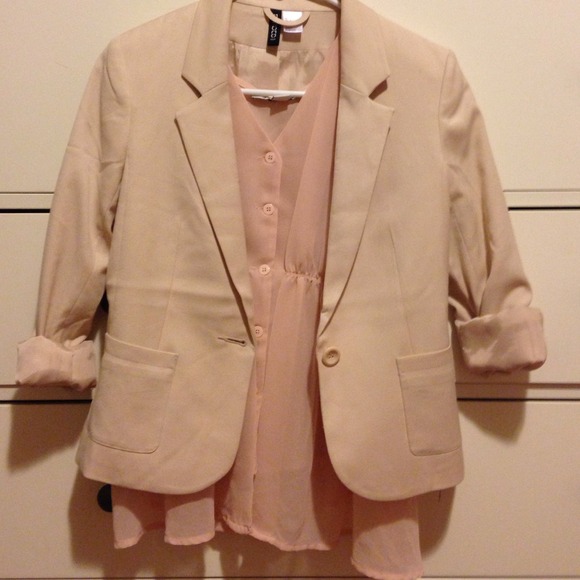 Cream blazer with pink buttoned top