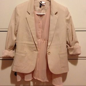 Cream blazer with pink buttoned top