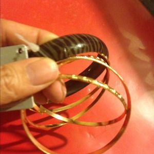 Zebra print and gold tone. Bangle set.