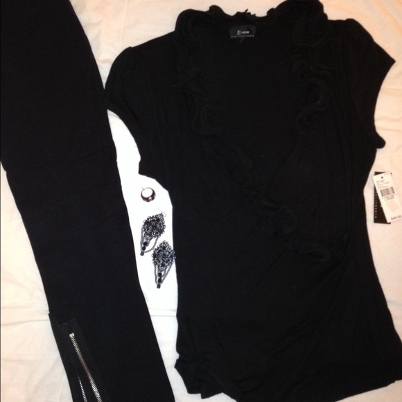 All black attire with black accessories