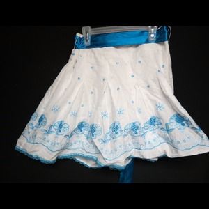 Teal skirt with detailed patterns