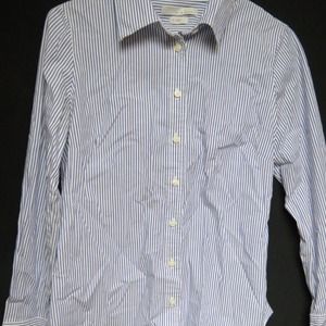 Blue and white striped fitted dress top.