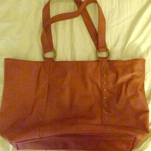 Brown leather tote with studded detail