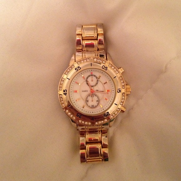 Gold Princess watch w/mother pearl bezzle