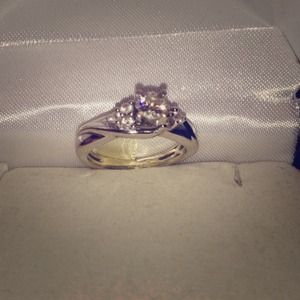 Size 4, engagement ring. 7 stones 1/2 karat.