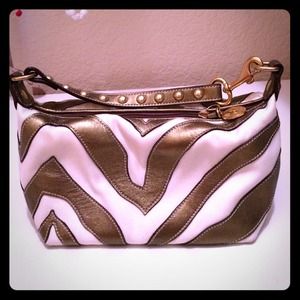 Gold and white Coach bag