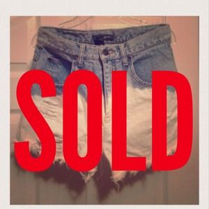 High-waisted distressed dip-dyed shorts