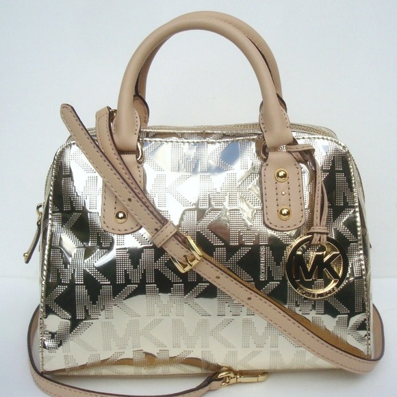 💗sold locally 💗Michael kors metallic gold bag