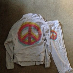 White sweatsuit and green sweat suit