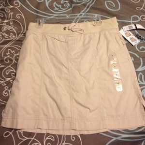 RXB Khaki skirt with shorts underneath.