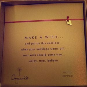 Dogeared dipped in gold heart necklace.