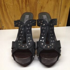 Grey and brown studded wedge sandals.