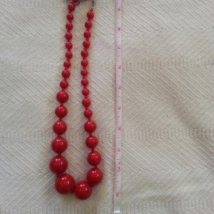 Red statement necklace