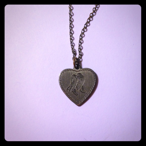 Pretty pewter bird in heart necklace