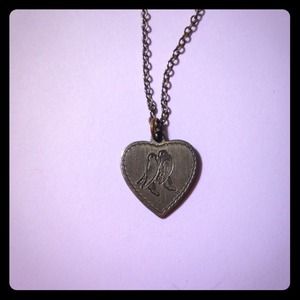 Pretty pewter bird in heart necklace