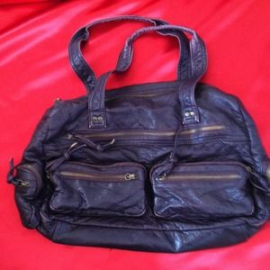 Big pocketed Decree purse.