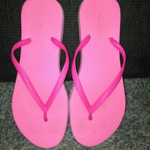 Light pink flip flops.