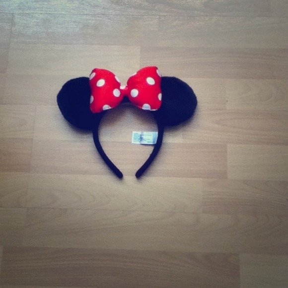 Red bow with white dots