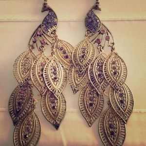 Beautiful dangling peacock earring.