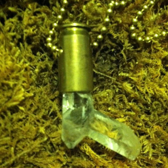 SOLD OFF POSHand brass bullet casing pendant