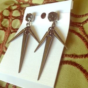 Brand new!!  Adorable little silver spikes