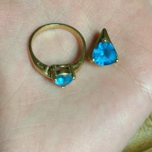 Blue topaz 14k gold w/ 1 real diamond and pendant.